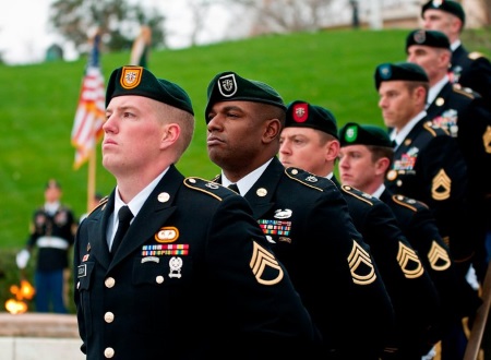 army green berets standing at attention