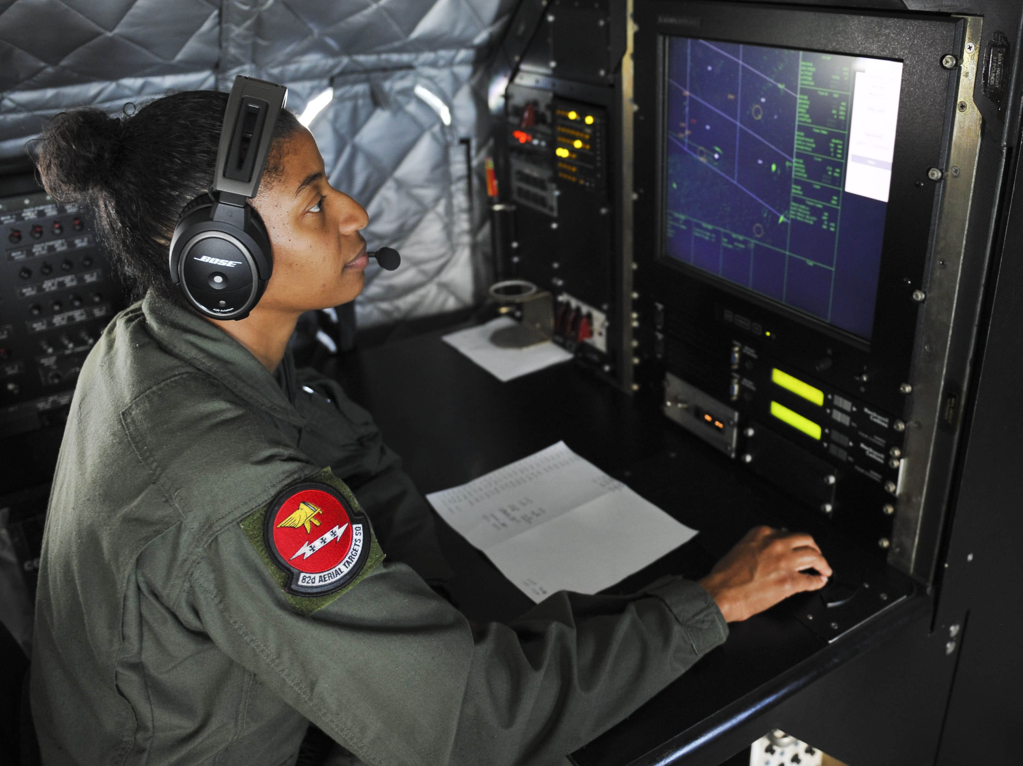 an Airborne Mission Systems Specialist at work