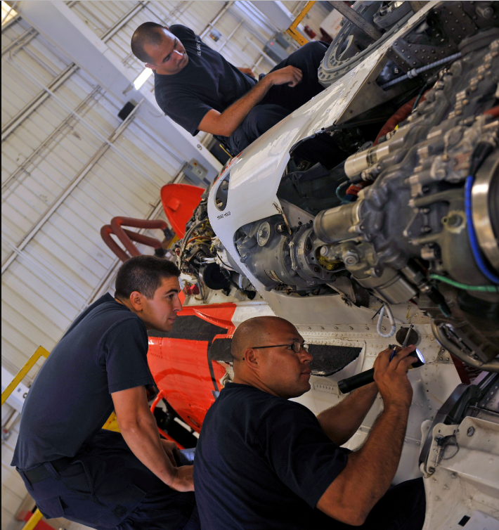 an Aviation Maintenance Technician at work