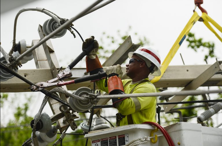 an Transmission and Distribution Specialist at work