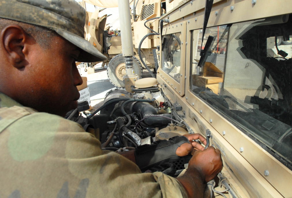 an Light Wheel Vehicle Mechanic at work