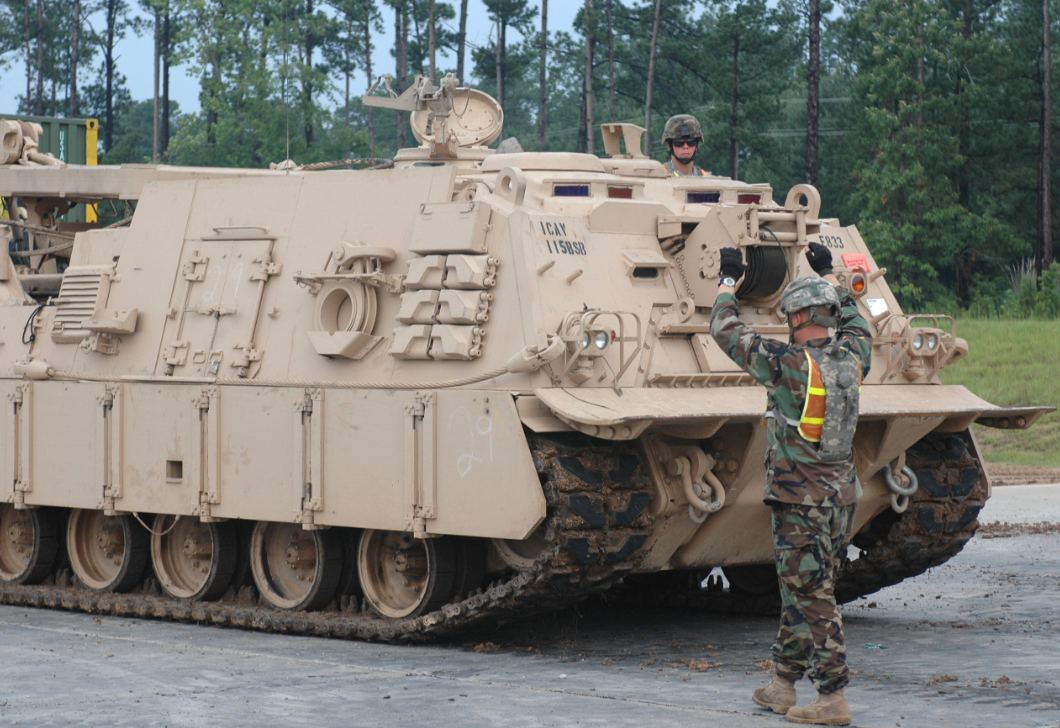 an Track Vehicle Mechanic at work