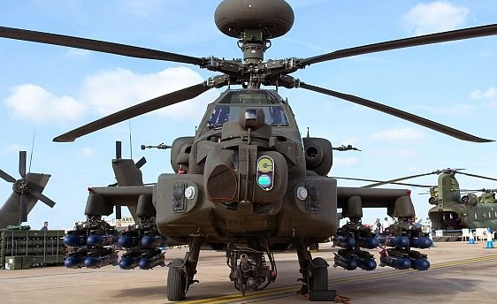 an AH-64 Attack Helicopter Repairer at work