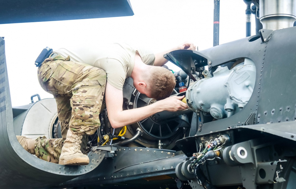 an UH-60 Helicopter Repairer at work