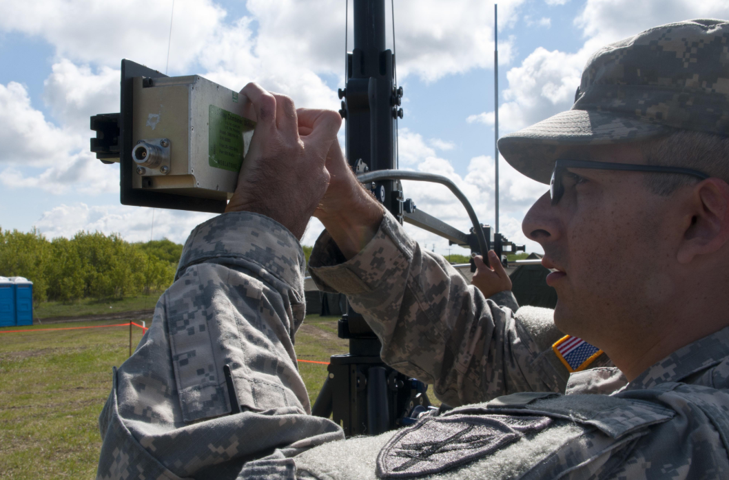 an Microwave System Operator/Maintainer at work