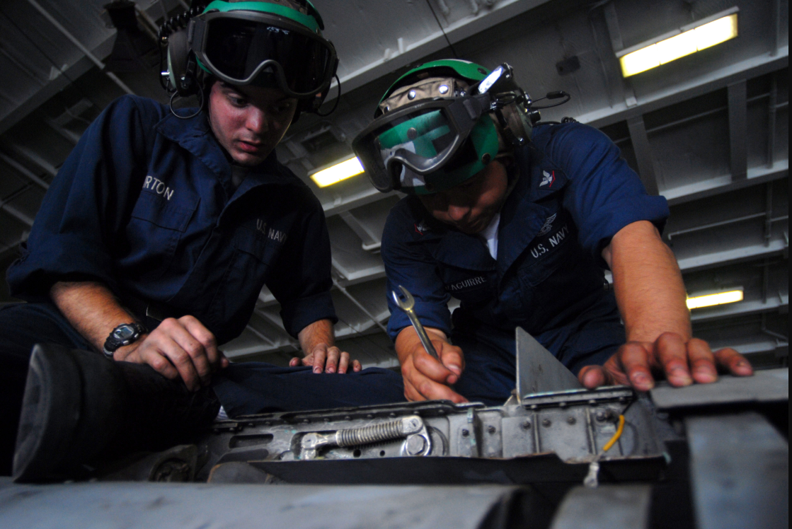 an Aviation Structural Mechanic at work