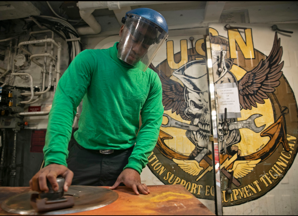 an Aviation Support Equipment Technician at work