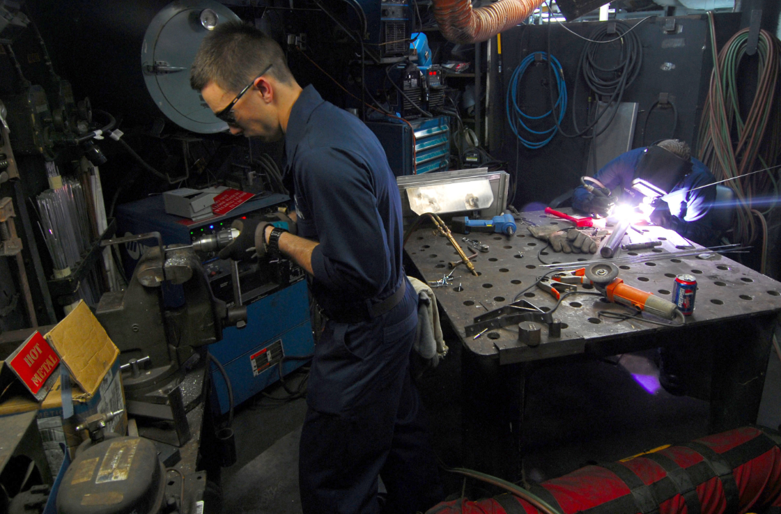 an Hull Maintenance Technician at work