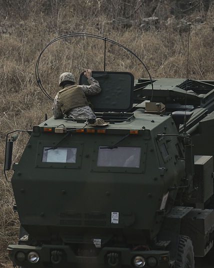 A High Mobility Artillery Rocket System (HIMARS) Operator at work