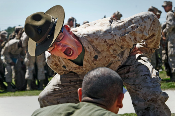 A Marine DI 'motivating' a recruit