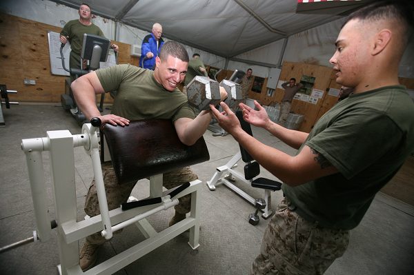 Maintenance Management Specialist working out while on deployment