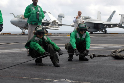 green shirt aircraft carrier