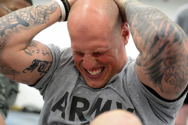 Soldier performs sit-ups during the Army Physical Fitness Test