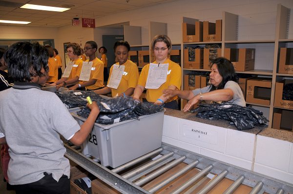 Female recruits at Recruit Training Command are issued the new navy working uniform