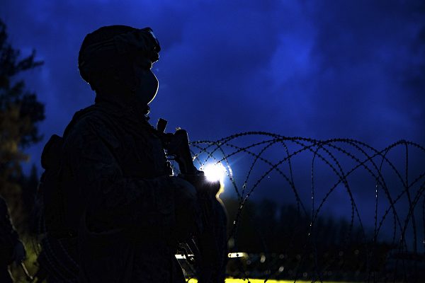 A U.S. Marine stands watch according the Marine General Orders