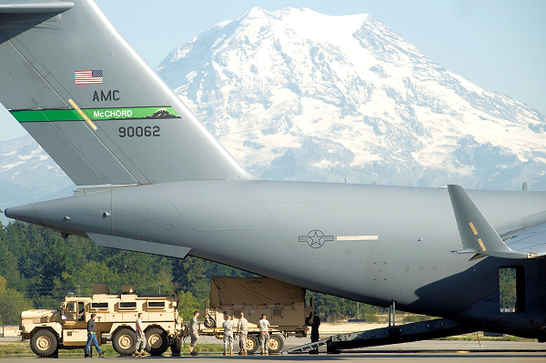 loading Army personnel at Joint Base Lewis-McChord