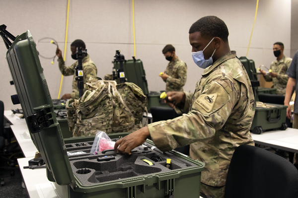 An Electronic Warfare Specialist in 1st Armored Division inventories assets