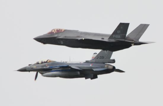 f16 and f35 flying in formation