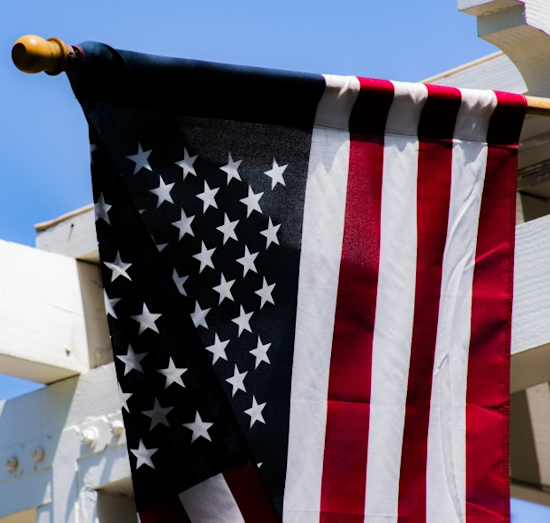 american flag hanging vertically