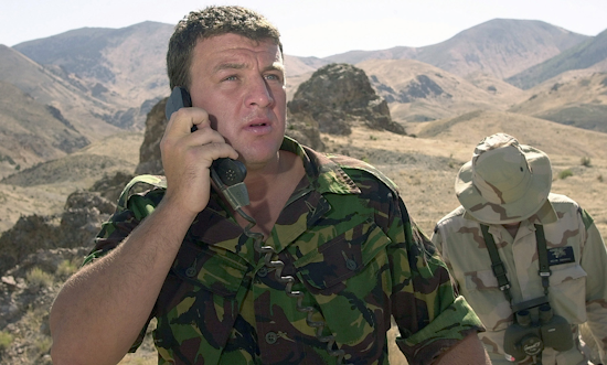 a british sas member calls in an air strike while working alongside navy seals